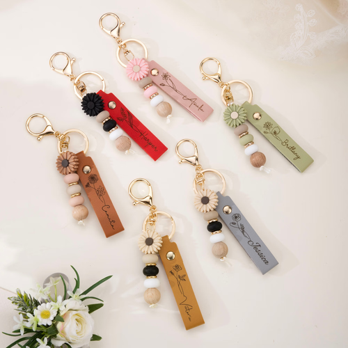 pu leather keychain with engraved name and daisy bead pendant